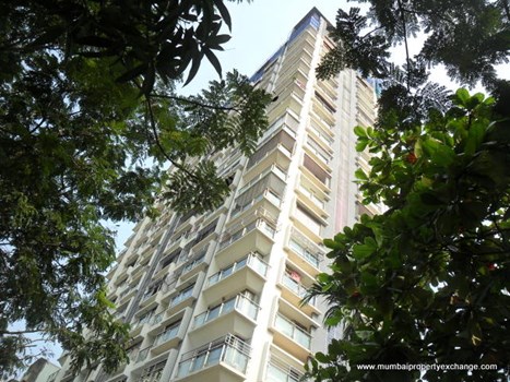 Poorna Apartments by 